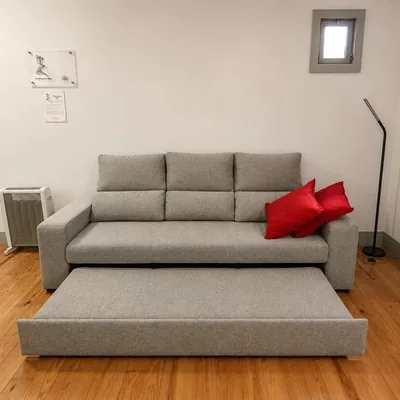 Sala de estar com sofá-cama em Guimarães
